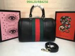 Stylish image featuring the Gucci Replica Boston Women AAAA Travel Bag RB4414, a classic black knockoff with Gucci Web leather accents.