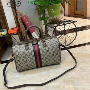 Elegant image showcasing the Gucci Replica Ophidia GG AAAA Medium Handbag UB9952, a stylish top handle bag.